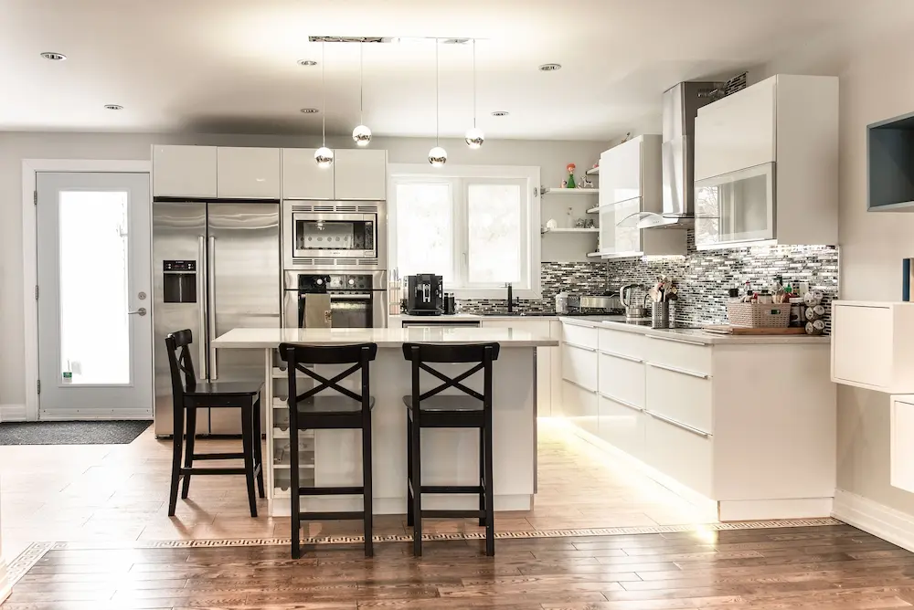 Large kitchen island with seating in luxury home interior